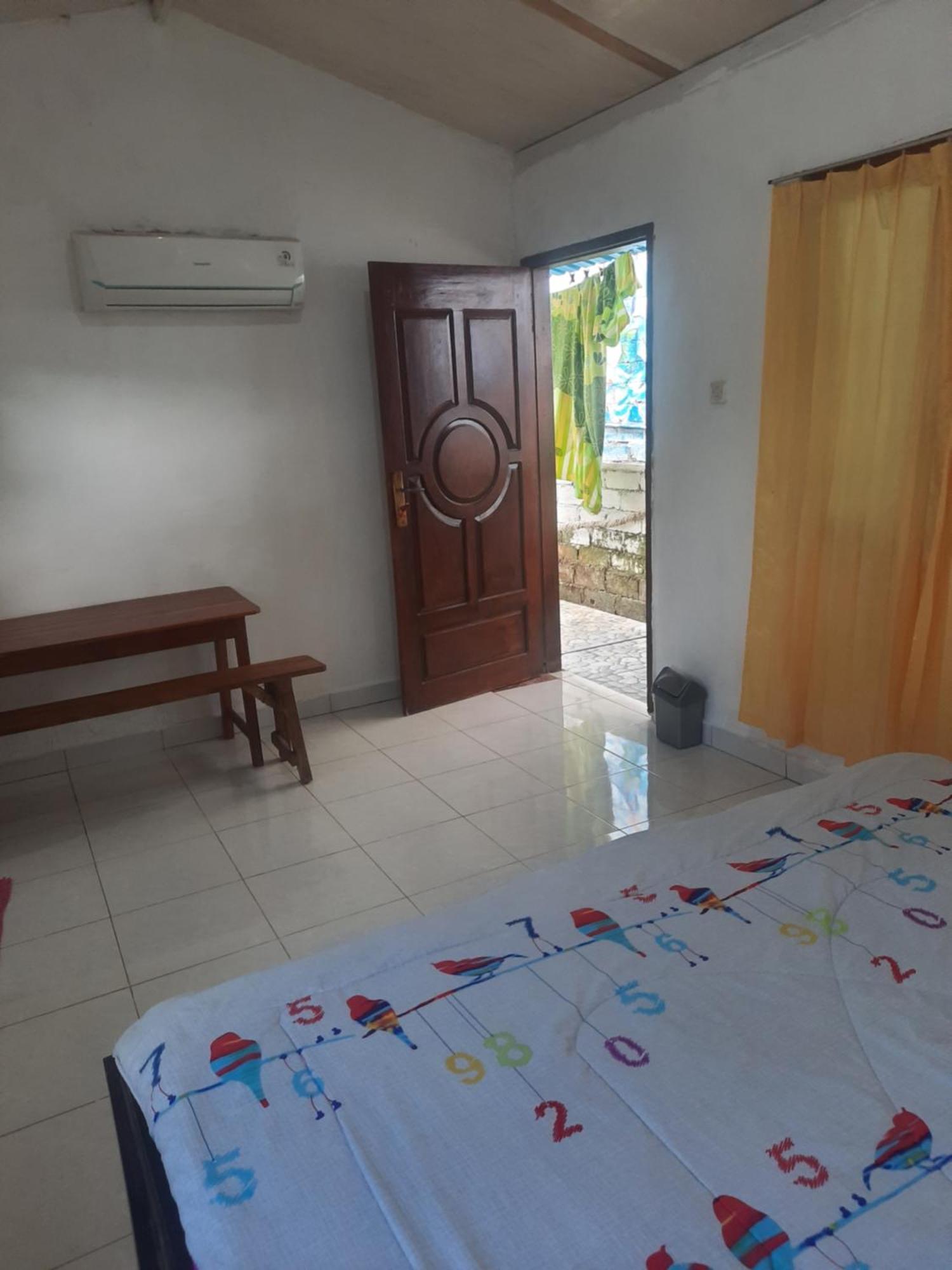 Red Beach Homestay Pasanggaran Cameră foto